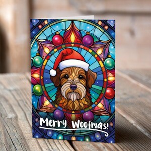 Carte de Noël Terrier gallois dans un bonnet de Noel