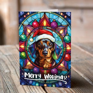 Carte de Noël Teckel pommelé dans un bonnet de Noel