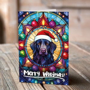 Carte de Noël Retriever à poil plat dans un bonnet de Noel