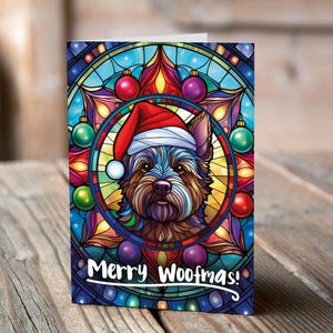 Carte de Noël Cairn terrier dans un bonnet de Noel