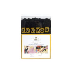 May include: A package of DMC Ebony tapestry wool. The package has a clear plastic top and a yellow and white label. The label features the DMC logo, the words "EBONY / ÉBÈNE / ÉBANO", and a colorful illustration. The package contains several spools of black wool.