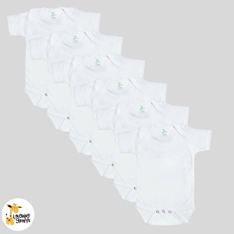 May include: Six white short-sleeved baby onesies with snap closures. The onesies are arranged in a stack, with the top onesie folded in half.