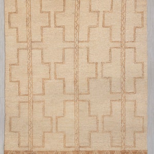 May include: A beige rug with a geometric pattern of brown crosses. The rug has a brown border with a diamond pattern. The rug is 8x10 feet, or 240x300 cm. G-2282 (252)