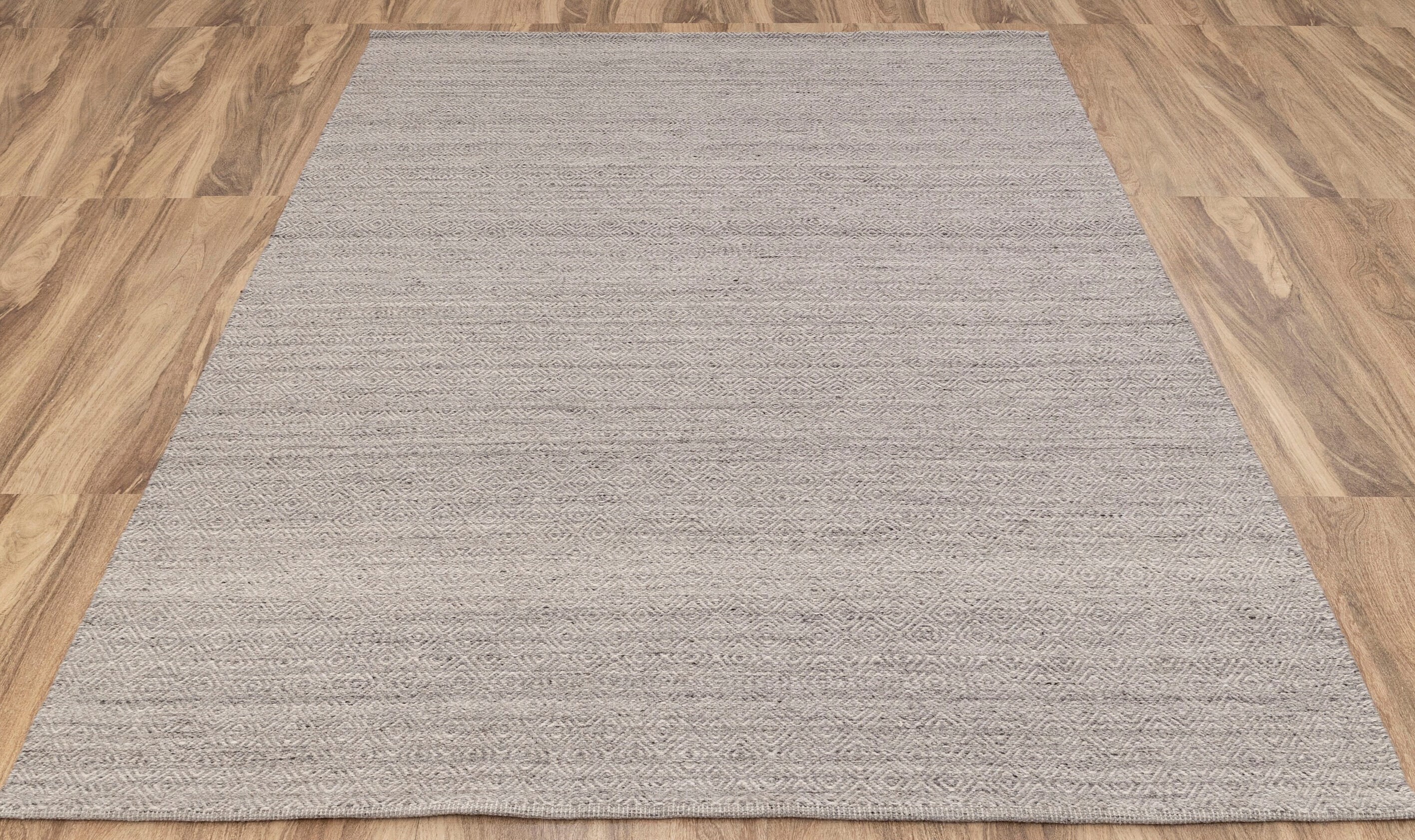 グレーアイボリーのモダンな幾何学模様の手織りウール平織りラグ