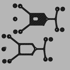 May include: Two black carbon fiber drone frame plates with a woven texture. Each plate features a central rectangular cutout, four extended arms with circular mounting holes at the ends, and additional small circular components positioned nearby.