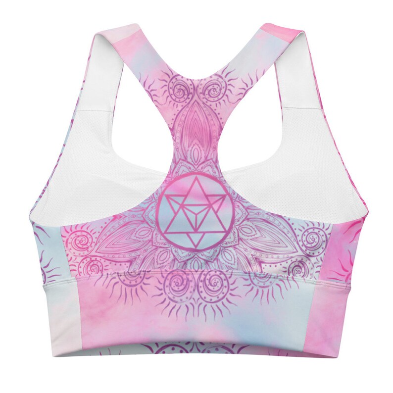 Goddess Swag Soul Star Chakra Mandala Racerback Sports Bra.  Background all over color is soft pastels of blues and pinks. the design on the front and back is the soul star with mandala in a deep pink.