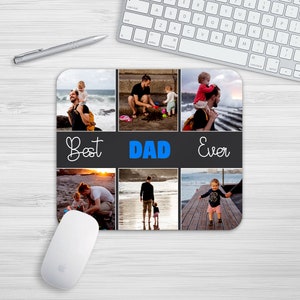 May include: A black and gray mouse pad with a collage of photos of a father and his children. The photos are arranged in a grid pattern with the words "Best Dad Ever" in white text on a black background.