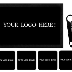 May include: A black bar mat with the text "YOUR LOGO HERE!" printed in white. The set includes four black coasters with the same text and a black bottle opener with the same text.