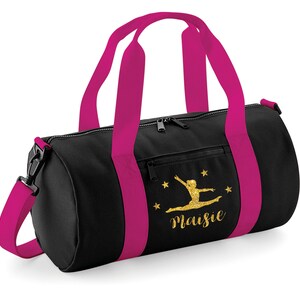 May include: Black gym bag with pink straps and a gold glitter design of a gymnast with the name Maisie.