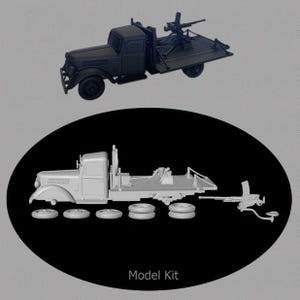 Puede incluir: Un kit de modelo que presenta un camión negro con una ametralladora montada en la plataforma, y una versión gris claro separada que muestra el chasis del camión, cinco neumáticos individuales y un componente de ametralladora, etiquetado Model Kit.