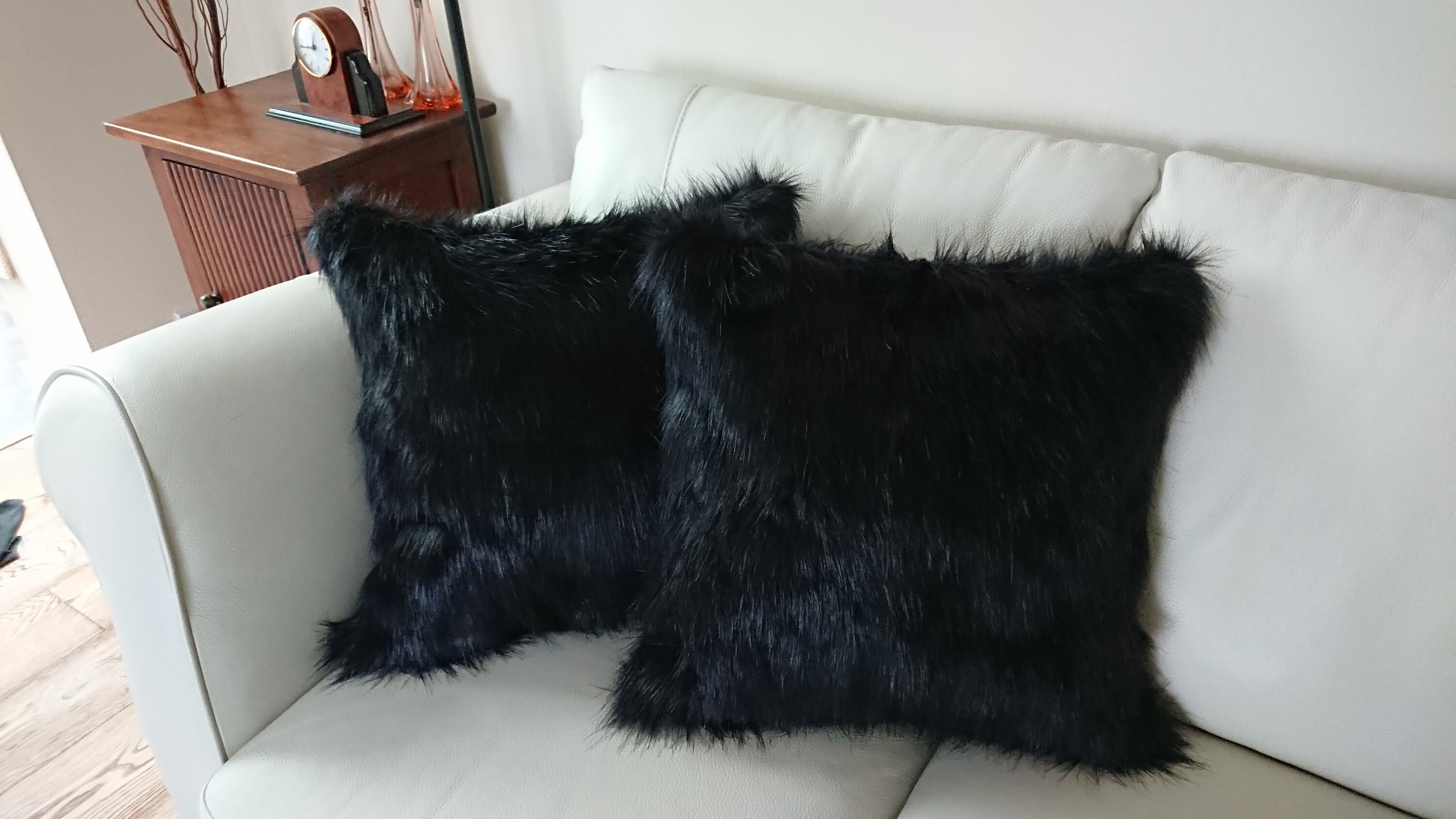 black fluffy cushions