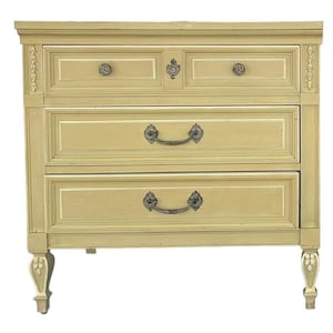 May include: A light green wooden dresser with three drawers and two smaller top drawers. The dresser has ornate metal handles and decorative accents on the sides and legs. The finish is distressed, giving it a vintage look.