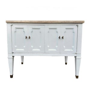 May include: White wooden cabinet with three doors and a light brown marble top. The cabinet has decorative details on the doors and sits on four legs.