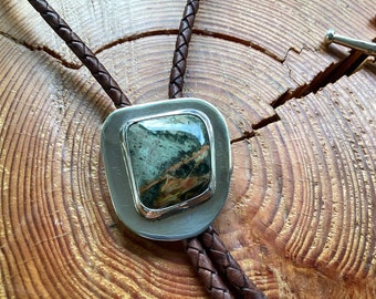 Morrisonite Jasper Bolo tie cut from rough rock. Handcrafted sterling silver mount and tips.  Man, lady, woman, unisex. Holiday gift.