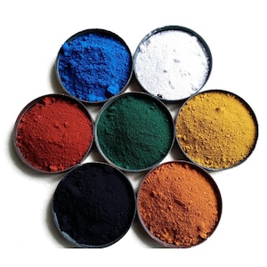 May include: Seven small bowls filled with different colored pigments. The colors are blue, white, red, green, yellow, black, and orange.