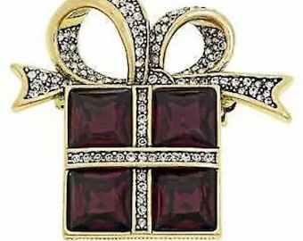 Heidi Daus “Glamorous Gift” Crystal Pin