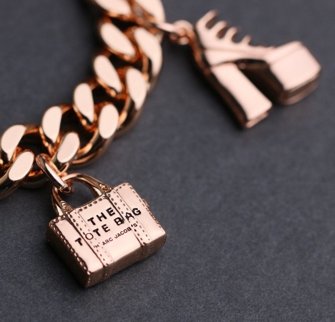 ブレスレット [MARC JACOBS]Mini Icon Charm Bracelet The Mini Icon Charm Bracelet| Marc Jacobs | Official Site