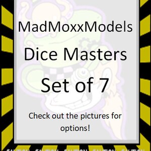 May include: A yellow and black caution tape border surrounds a white rectangle with the text "MadMoxxModels Dice Masters Set of 7" and the text "Check out the pictures for options!"  The image features a cartoon illustration of a green and purple creature with a large eye.