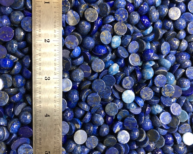 Lapis Lazuli 10mm Plus Minus Natural Denim Cabachon will fit in Bezel Cups - Product of Afganistan. Sold by the each.