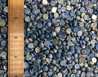 Lapis Lazuli 8mm Plus Minus Natural Denim Cabachon will fit in Bezel Cups - Product of Afganistan. Sold by the each.