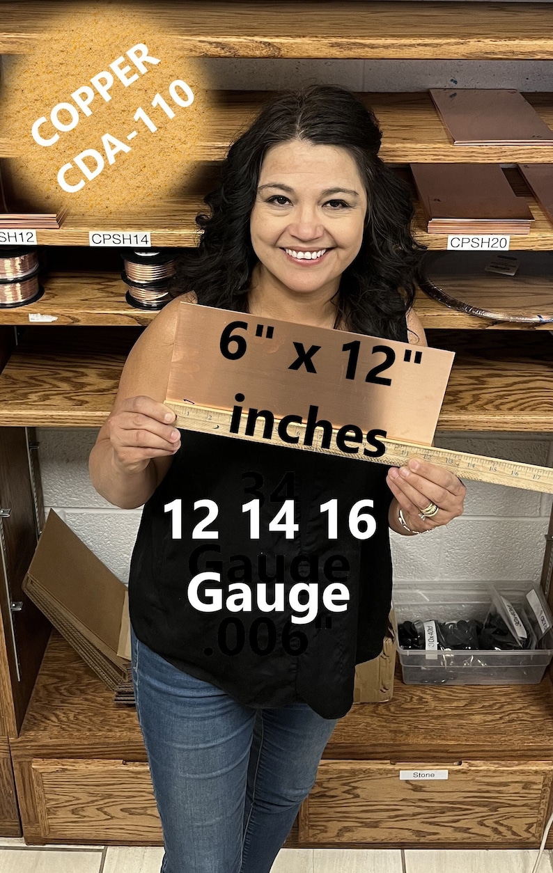May include: A woman is holding a 6 by 12 inch sheet of copper, labelled "COPPER CDA-110", with a ruler showing the measurements and the text "12 14 16 Gauge .006".