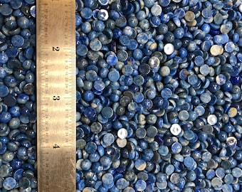 Lapis Lazuli 6mm Plus Minus Natural Denim Cabachon will fit in Bezel Cups - Product of Afganistan. Sold by the each.