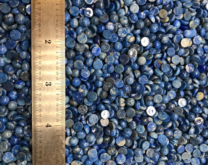 Lapis Lazuli 6mm Plus Minus Natural Denim Cabachon will fit in Bezel Cups - Product of Afganistan. Sold by the each.