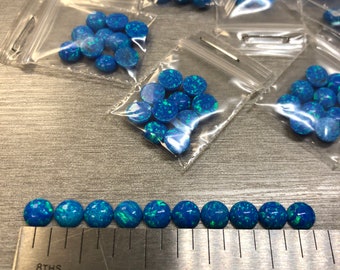 Synthetic Imitation 6mm Round Opal from Kyocera #5A Pacific Blue "Name Brand" compaired to other Lab Grown Opal
