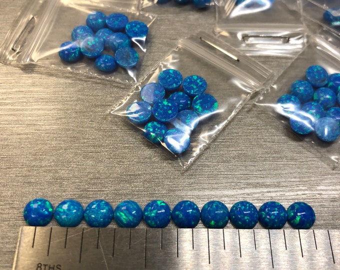 Synthetic Imitation 6mm Round Opal from Kyocera #5A Pacific Blue "Name Brand" compaired to other Lab Grown Opal