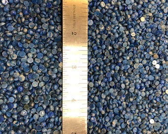 Lapis Lazuli 4mm Plus Minus Natural Denim Cabachon will fit in Bezel Cups - Product of Afganistan. Sold by the each.