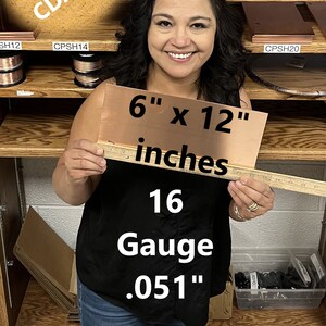 May include: A 6 inch by 12 inch sheet of copper, 16 gauge, 0.051 inches thick. The copper sheet is held by a person in front of a wooden shelf with various copper wire spools.