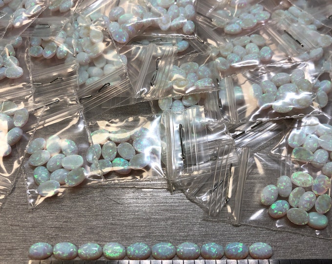 Synthetic Imitation 4x6mm Oval Opal from Kyocera 17 "Name Brand" compaired to other Lab Grown Opal