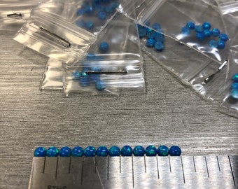 Synthetic Imitation 3mm Round Opal from Kyocera 5A Pacific Blue "Name Brand" compaired to other Lab Grown Opal