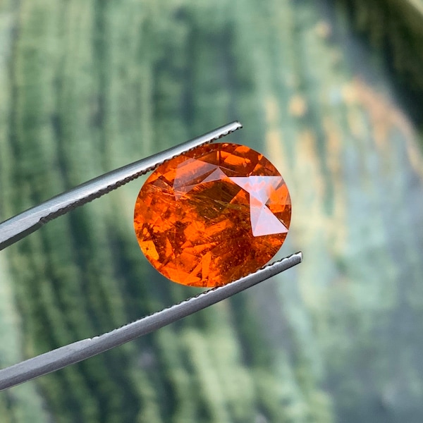 11.96 CT Remarkable Orange Oval 100 % Natural Orange Spessartite - 14x12mm