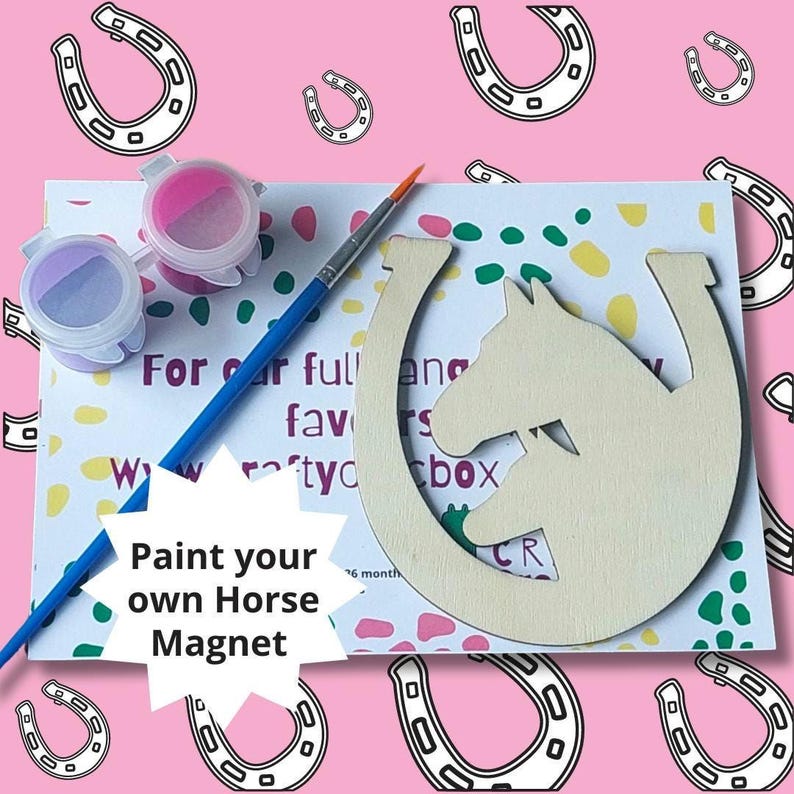 May include: A paint-your-own horse magnet craft kit. The kit includes a wooden horseshoe-shaped cutout with a horse silhouette, paint pots, and a paintbrush. The text on the card reads "Paint your own Horse Magnet".