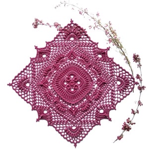 May include: A handmade, burgundy crochet doily with a square shape and intricate openwork design. The doily features a central square motif surrounded by detailed patterns and scalloped edges. The image also includes text that says "CROCHET PATTERN PHOTO TUTORIAL ENGLISH RUSSIAN".