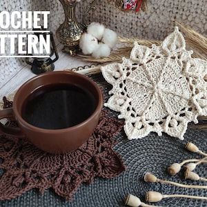 May include: Two crocheted doilies, one brown and one white, are shown on a gray surface. The white doily is in the background and the brown doily is in the foreground. The text "CROCHET PATTERN" is visible at the top of the image.