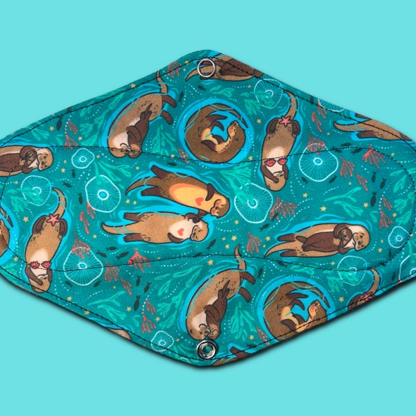 9.5" Otters In Love Cloth Pad. Handmade + Designed in Australia. Crafted With Soft + Natural 100% Cotton Fabrics. Black Backing