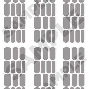 May include: A set of 18 gray nail stickers in a rectangular shape. The stickers are arranged in three rows of six stickers each.
