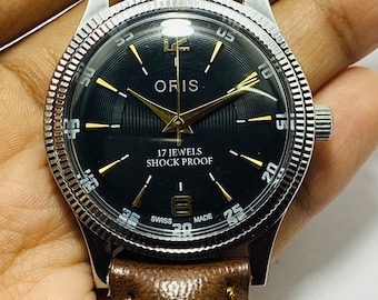 Raro reloj de pulsera vintage ORIS con esfera negra y cuerda manual para hombre Movimiento FHF ST-96 Suizo