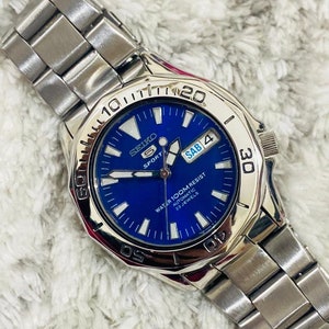 Vintage Seiko 5 Sports Rotating Bazel Automatic 21 Jewel Movement No.7S36 Dag/Datum herenpolshorloge