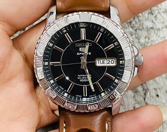 Vintage Seiko 5 Sports 100m Automatic 23jewels Black Dial