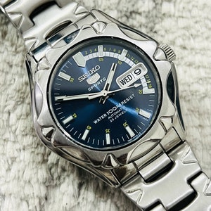 Vintage Seiko 5 Sports 100m Automatic 23Jewels Blue Dial Date/Day With Skeleton Back Japan Made Men&#39;s Wrist Watch~ Gift for him