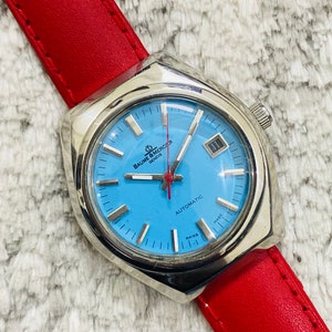 Vintage Baume & Mercier Geneve Automatic Swiss Movement Blue Dial Date/Day Men’s Watch