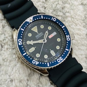  Seiko SKX009K2 reloj analógico automático de acero inoxidable  para hombre : Ropa, Zapatos y Joyería