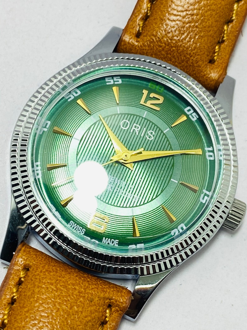 Orologio da polso da uomo svizzero raro vintage ORIS con quadrante verde e movimento meccanico a carica manuale ST-96 immagine 7