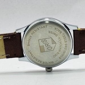 Rare vintage ORIS cadran noir montre-bracelet à remontage manuel pour homme mouvement FHF ST-96 suisse image 8