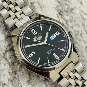 Reloj de pulsera Seiko 5 automático vintage, raro, con esfera negra, 21 joyas, fecha y día, fabricado en Japón. Regalo para él o ella.