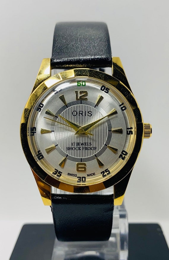 Raro reloj de pulsera vintage ORIS con esfera blanca y cuerda