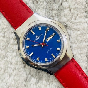Vintage Baume & Mercier Geneve Automatic Swiss Movement Blue Dial Date/Day Men’s Watch